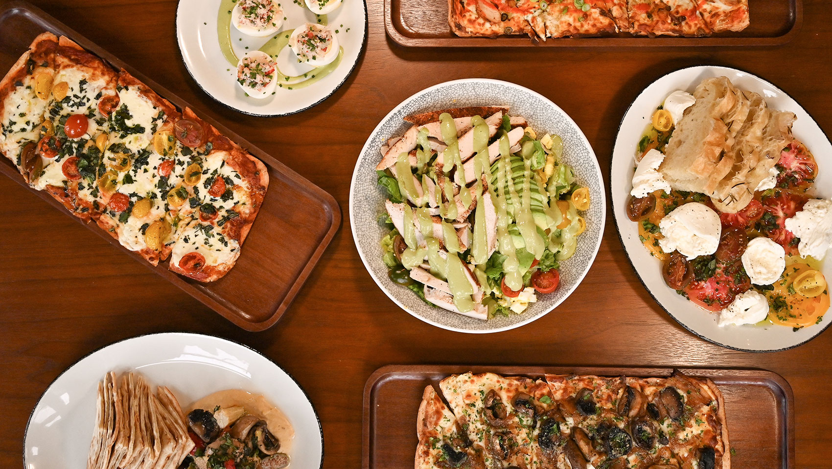 overhead view of a table setting with plates of food